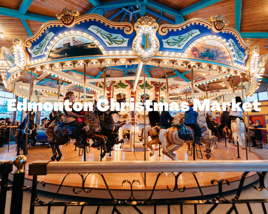 Colorful carousel at the Edmonton Christmas Market with people around